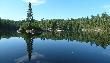 Rejon Temagami usiany jest jeziorami, �wietny to teren do kanuingu. Z jednego jeziora do drugiego przechodzi sie �cie�k� tzw. porta�u, przenosz�c na plecach kanu i ca�y ekwipunek biwakowy. 